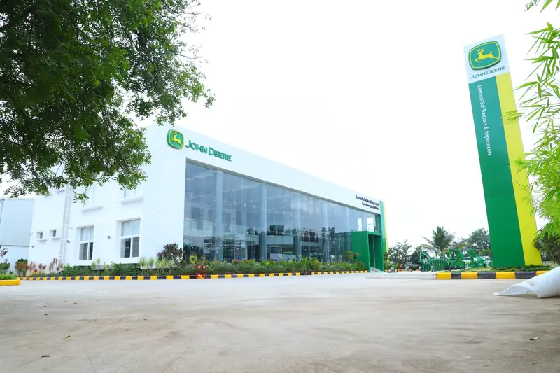 Showroom with the green signage tower