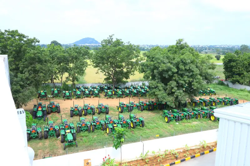 Tractors lined up in the yard